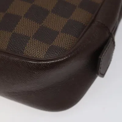 Pre-owned Louis Vuitton Trousse De Toilette 25 Brown Canvas Clutch Bag ()