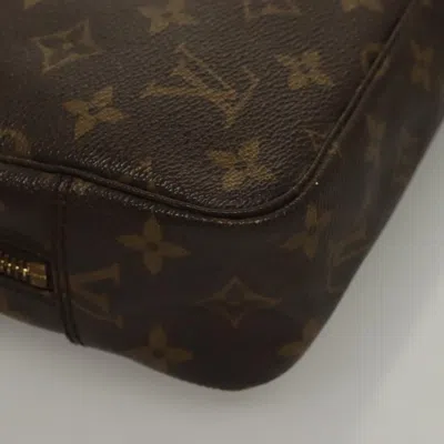 Pre-owned Louis Vuitton Trousse De Toilette Brown Canvas Clutch Bag ()