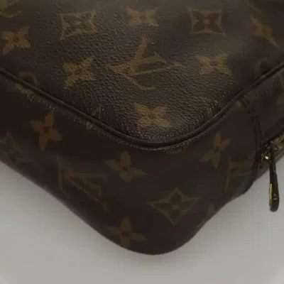 Pre-owned Louis Vuitton Trousse De Toilette Brown Canvas Clutch Bag ()