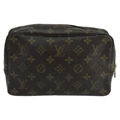 Pre-owned Louis Vuitton Trousse De Toilette Brown Canvas Clutch Bag ()