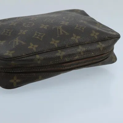 Pre-owned Louis Vuitton Trousse De Toilette Brown Canvas Clutch Bag ()