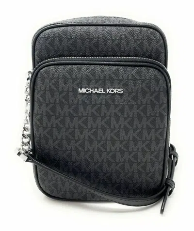 Michael Kors Jet Set Travel Black Mk Signature Pvc Medium Flight Crossbody Bag In Black