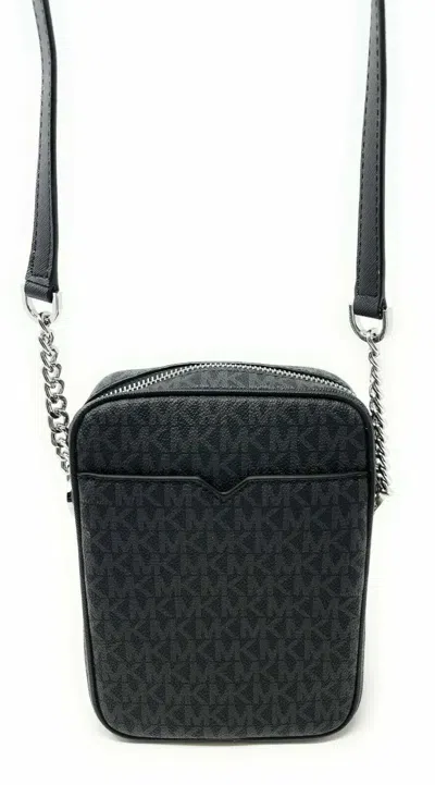 Michael Kors Jet Set Travel Black Mk Signature Pvc Medium Flight Crossbody Bag In Black