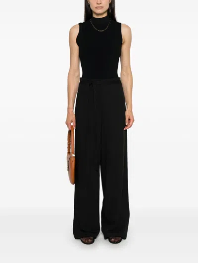 Totême Tie-waist Fluid Trousers In Black
