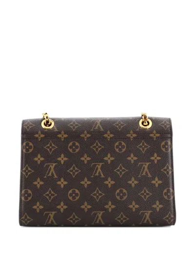 Pre-owned Louis Vuitton Victoire Handbag Monogram Canvas And Leather Shoulder Bag In Brown