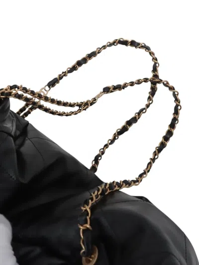 Pre-owned Chanel 2021-2025 Small Shiny Quilted Calfskin 22 Backpack In Black