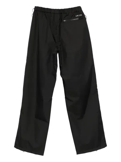 Gr10k Zip-pocket Trousers In Black