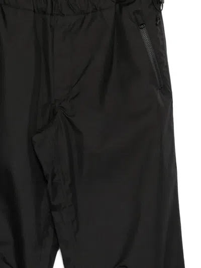 Gr10k Zip-pocket Trousers In Black