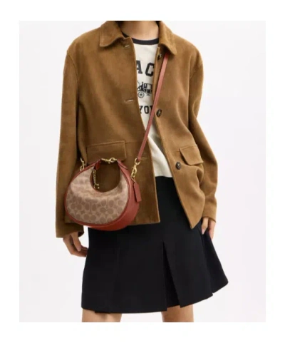 Coach Coated Canvas Signature Jonie Bag 22 In Brown