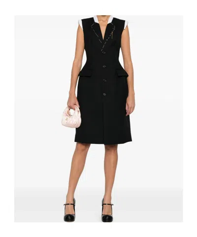Moschino Stylish Sleeveless Dress Featuring Flap Pockets In Black