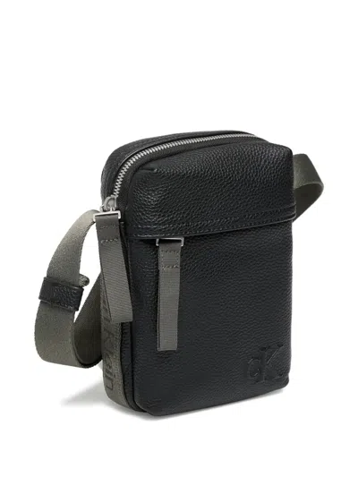 Calvin Klein Jeans Est.1978 Small Logo-embossed Messenger Bag In Black