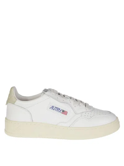 Autry Low-top Leather Sneakers With Metallic Gold Accents In White