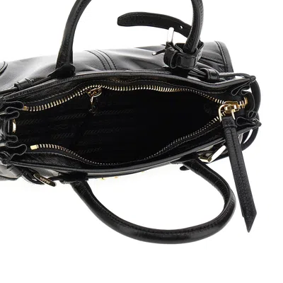 Prada Handheld Clutch With Buckle And Drawstring In Black