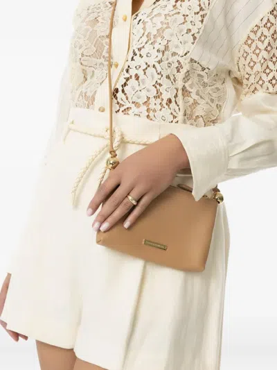 Loeffler Randall Yasmine Logo-plaque Crossbody Bag In Neutral