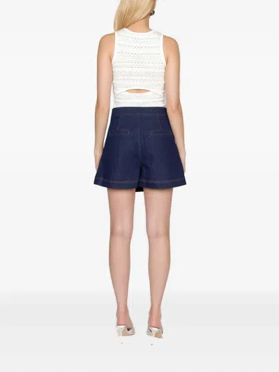 Christy Lynn Maddie Buckle-fastening Wrap Shorts In Blue