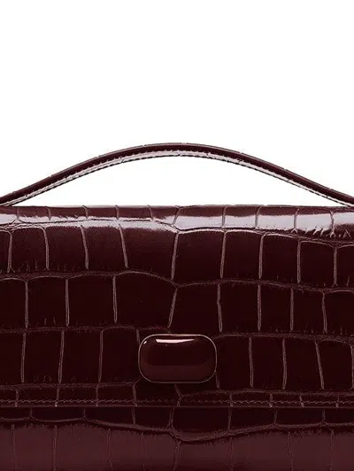 Jeffrey Levinson Alex Crocodile-effect Clutch Bag In Burgundy