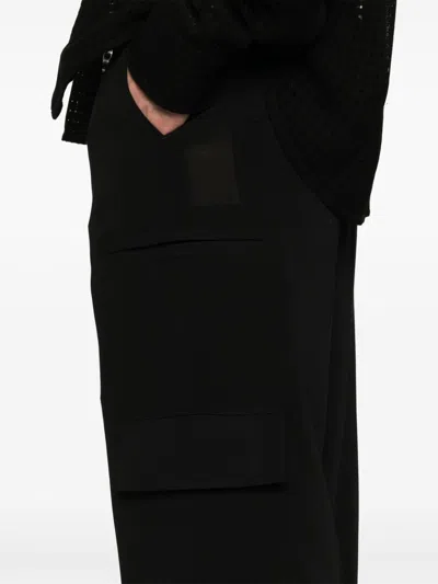 Namacheko Guardia Trousers Featuring Multiple Pockets In Black