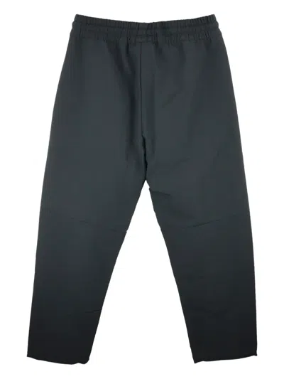 Fear Of God Woven Storm Trousers In Black
