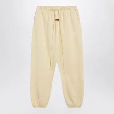 Essentials Logo Patch Track Pants In Yellow