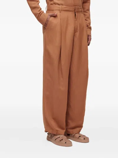 Osklen Pleated Linen Trousers In Brown