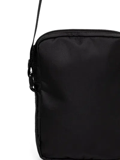 Undercover Small Graphic Buckle Messenger Bag In Black