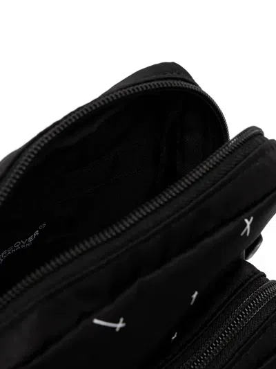 Undercover Small Graphic Buckle Messenger Bag In Black