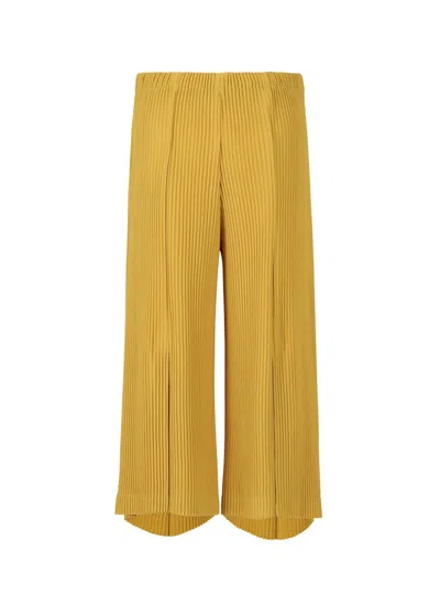 Issey Miyake Mc June Pleated Trousers In Yellow