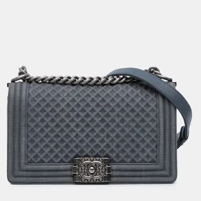 Pre-owned Chanel Blue Medium Embossed Denim Boy Flap