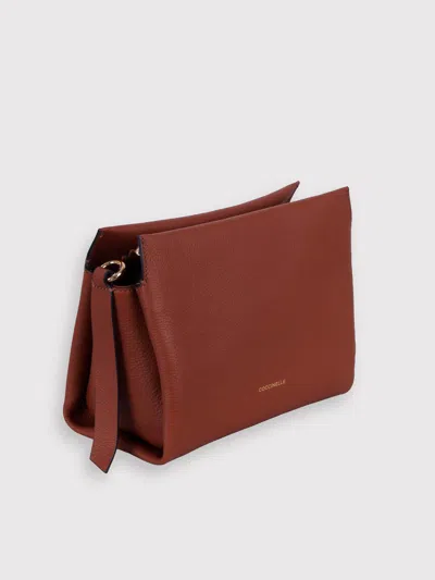 Coccinelle Boheme Handbag In Brown
