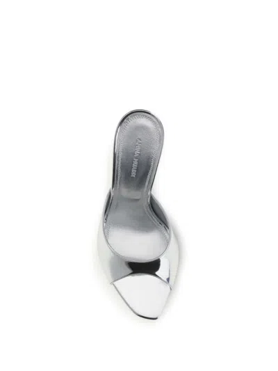 Amina Muaddi Alexa 95 Metallic Leather Mules In Silver
