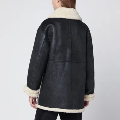 Dunst Reversible Unisex Shearling Jacket In Black