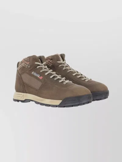 Autry Low Top Sneakers With Round Toe And Ridged Sole In Brown