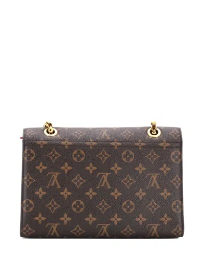 Pre-owned Louis Vuitton Victoire Handbag Monogram Canvas And Leather Shoulder Bag In Brown