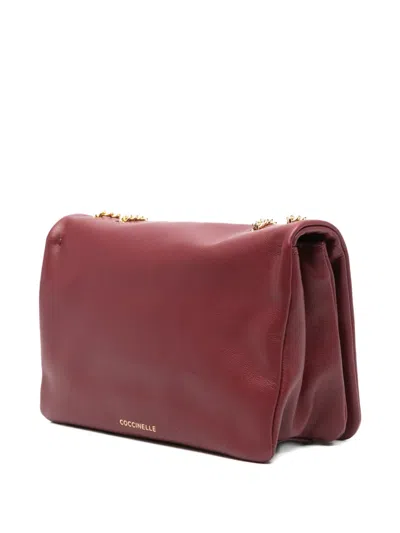 Coccinelle Mini Dulse Cross Body Bag In Red