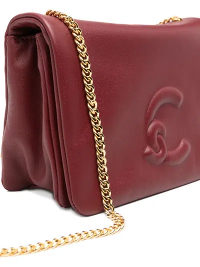 Coccinelle Mini Dulse Cross Body Bag In Red