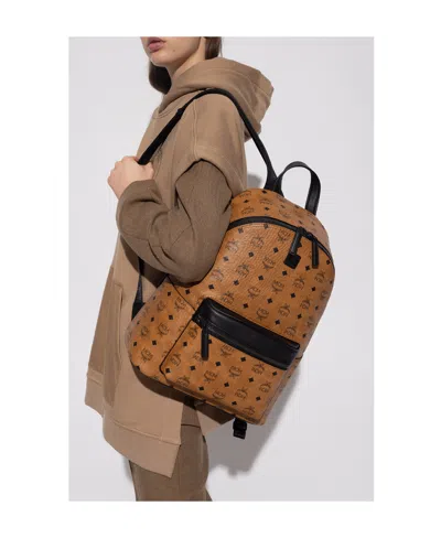 Mcm Stark Monogram Print Zipped Backpack In Brown