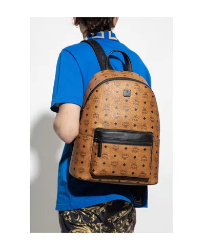 Mcm Stark Monogram Print Zipped Backpack In Brown