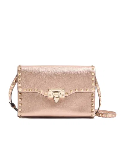 Valentino Garavani  Garavani Rockstud Small Crossbody Bag In Laminated Grainy Calfskin Leat In Pink