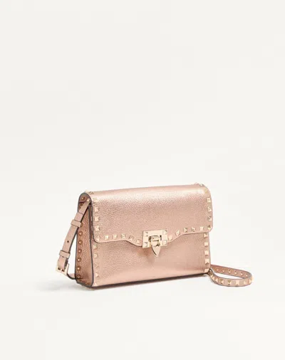 Valentino Garavani  Garavani Rockstud Small Crossbody Bag In Laminated Grainy Calfskin Leat In Pink