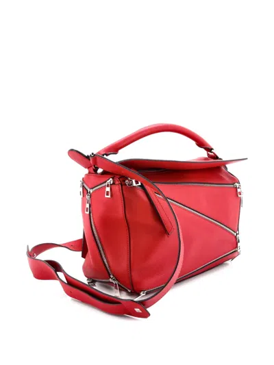 Pre-owned Loewe Puzzle Bag Zipper Embellished Leather Medium Satchel In Red