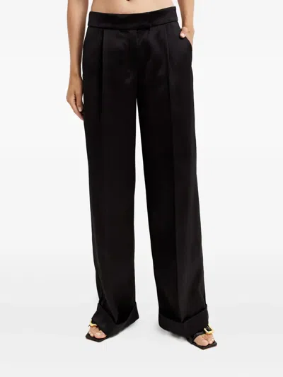 Nué Pleated Tailored Trousers In Black