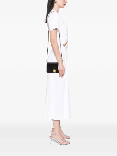 Pre-owned Chanel 2019 Lambskin Pyramid Wallet On Chain Crossbody Bag In Black