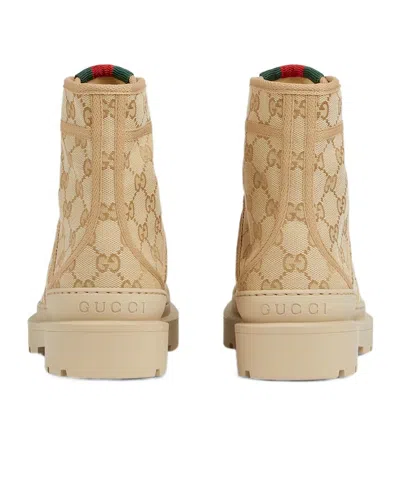 Gucci Gg Monogram Canvas Combat Boots In Neutral