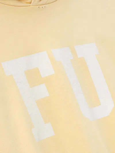 Fear Of God Hooded Graphic Print Long Sleeve Sweatshirt In Yellow