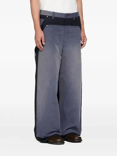 Khoki Pinstripe Panelled Trousers In Blue