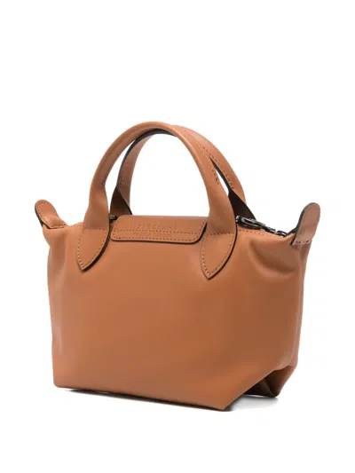 Longchamp Extra Small Le Pliage Xtra Leather Top Handle Bag In Brown