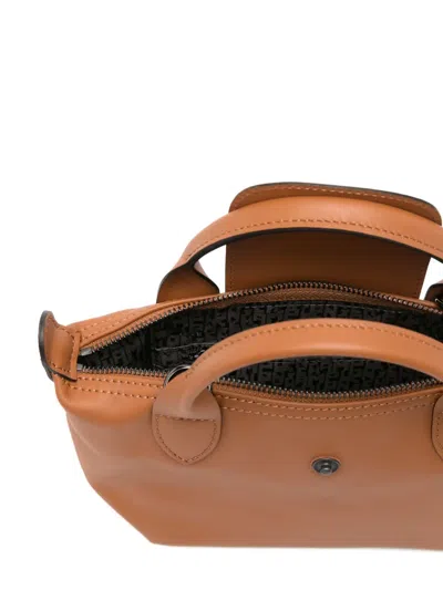 Longchamp Extra Small Le Pliage Xtra Leather Top Handle Bag In Brown
