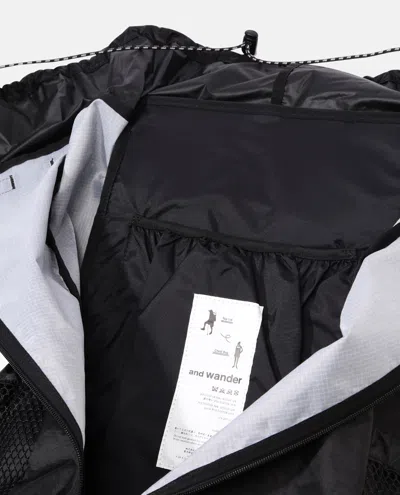 And Wander Adjustable-straps Backpack In Black