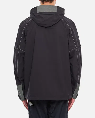 And Wander Pertex Shield Rain Jacket In Black