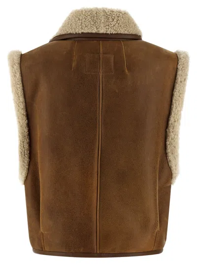 Isabel Marant Alime Shearling-trimmed Leather Sleeveless Jacket In Brown